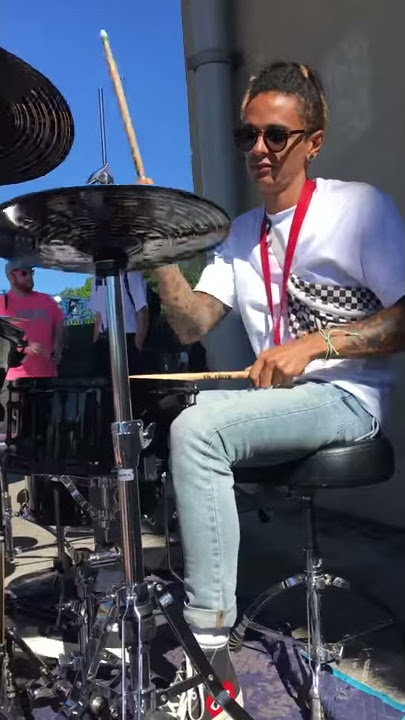 Dani Washington of Neck Deep drumming backstage warped tour 2017