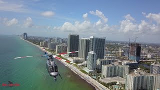 Near-miss video shows risk of flying drones in busy airspace as helicopter suddenly appears