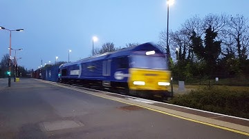 Maritime livery Class 66 passes through Acocks Green