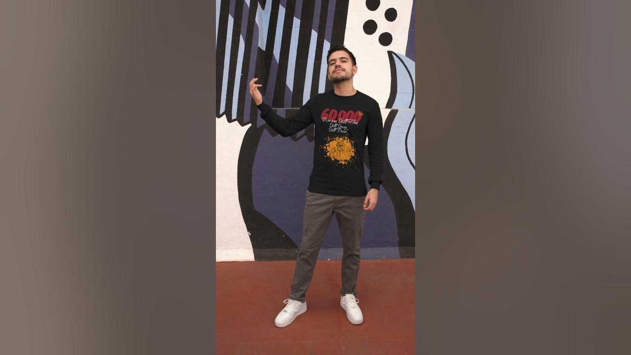 t shirt and hoodie video mockup featuring a man making a tiktok fashion challenge 6217v