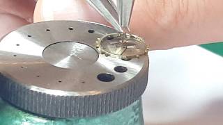 Attaching A Watch Hairspring Onto Balance Wheel