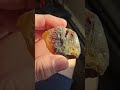 not sure what this is... yellow agate, maybe. translucent except for the root beer colored part.