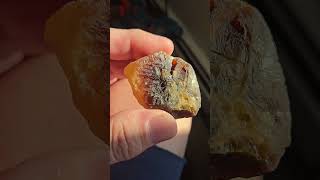 not sure what this is... yellow agate, maybe. translucent except for the root beer colored part.