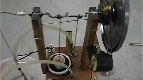 Small DIY Stirling engine charges cell phone