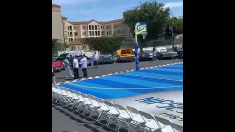 Basketball court painting with Nipsey Hussle face on it