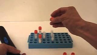 Person Decapper for Corning 2mL Vials on Interlocking One-Hand Rack