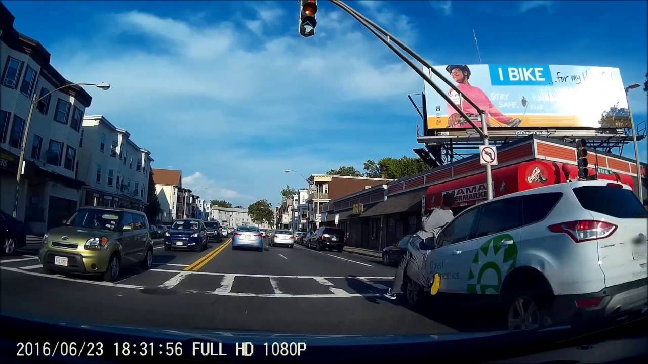 Dash Cam Footage of Crazy Guy running into Street Smashes into Car