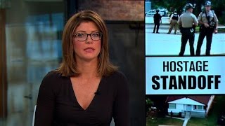 Four held hostage in Chicago suburb