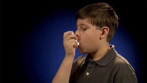 Using a metered dose inhaler (inhaler in mouth)