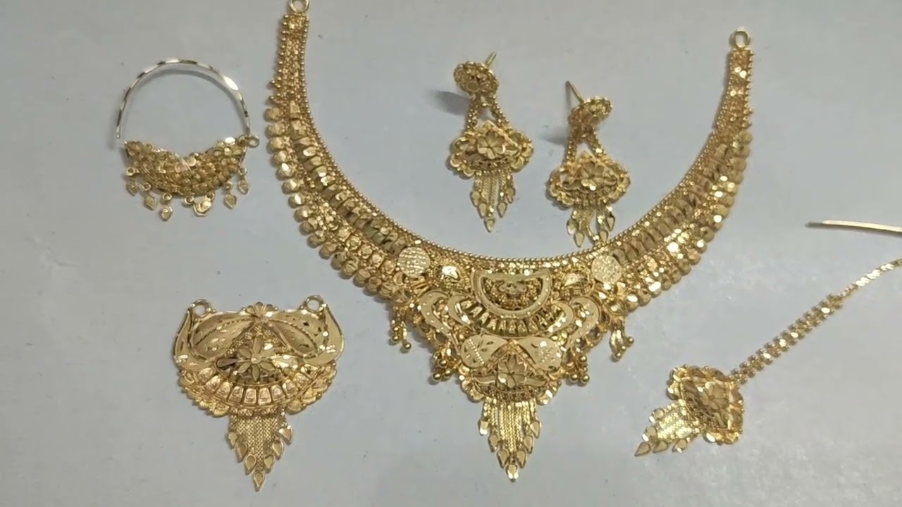22 carat latest Gold set pendant nath tika design 