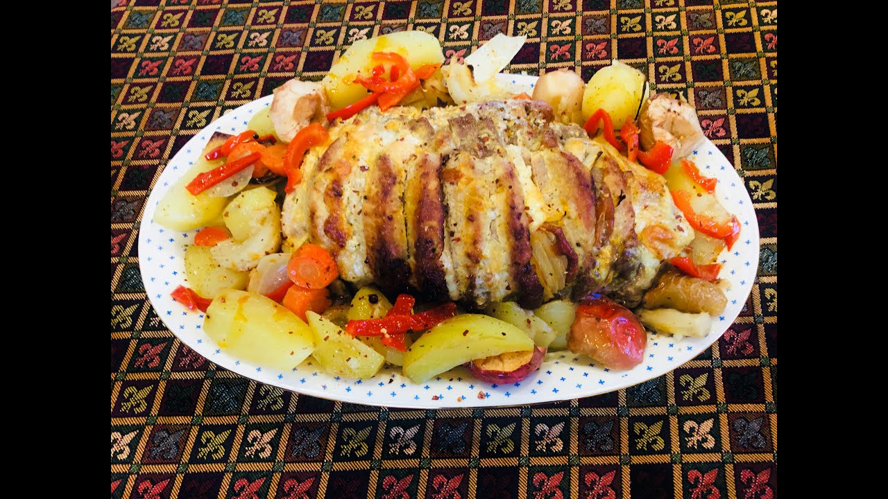 Жареная свиная вырезка с сыром моцарелла и овощами