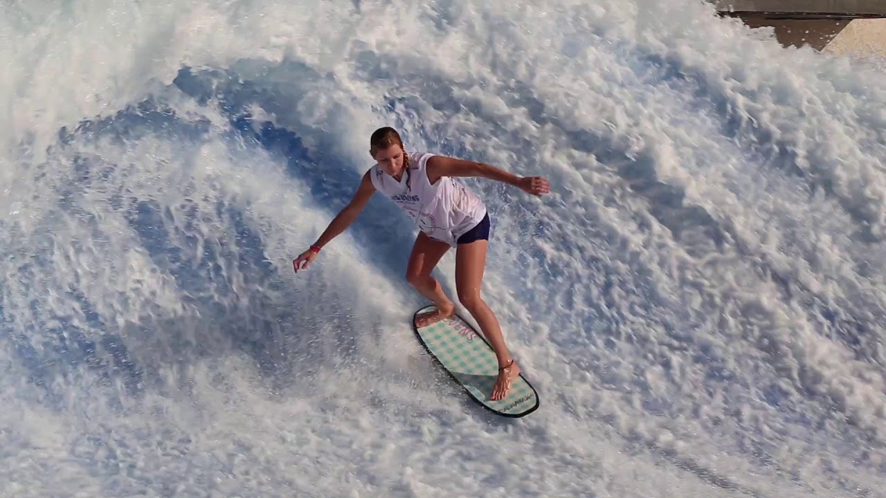 Girl standup riders on the FlowRider Flow Barrel in Abu Dhabi at Yas ...