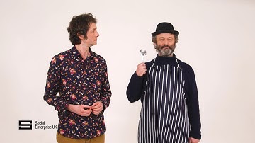 Why is Michael Sheen holding a spanner and what are social enterprises?! Chris Addison explains all.