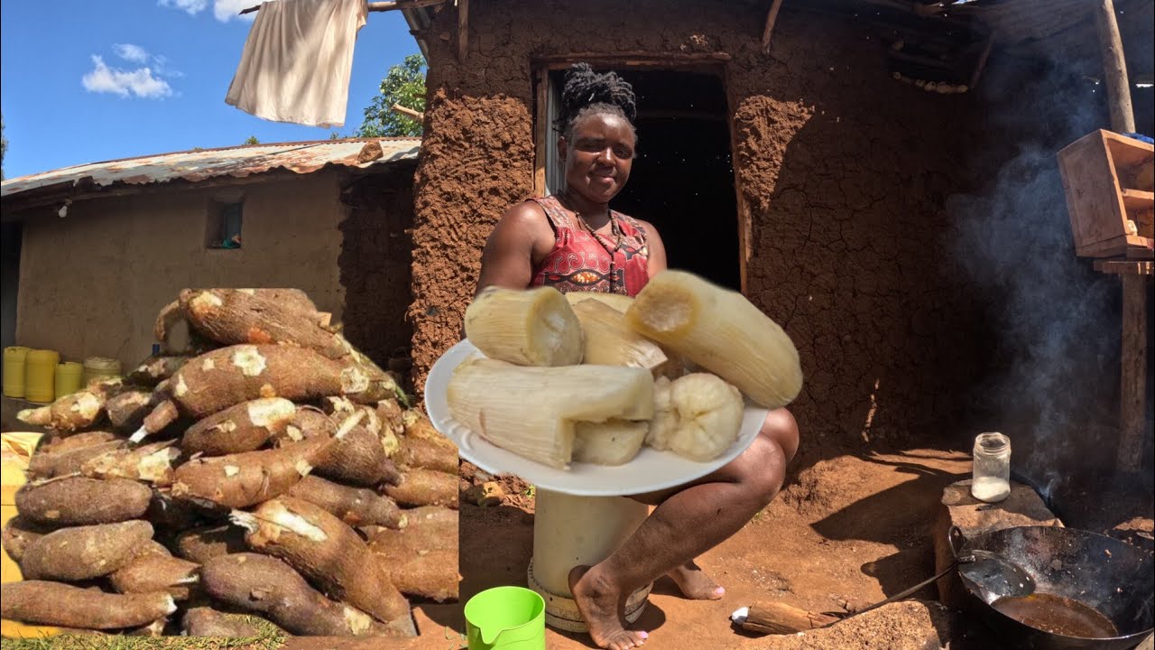 Typical village life of young girl cooking simple breakfast for the family 