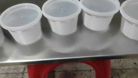 automatic taper jar cup label application machine #labelingmachine #auto #machinery