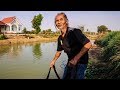 Cambodian Hippy Catches Fish and Cooks for Us