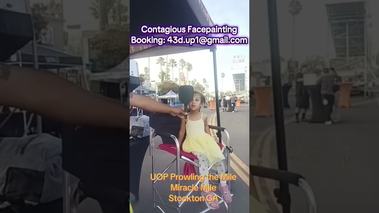 Facepainting at the UOP Prowling the Mile Event on Miracle Mile in Stockton for the Tigers.