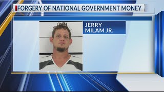 Police: man charged in connection with counterfeit $100 bills
