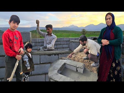 Emmbers of Resilience: Ali Family's in Constructing a Fire Fireplace and Finishing Shelter Walls