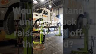 Would you stand under a truck raised 5 ft off the ground? #diesel #dieselengine #mechanic
