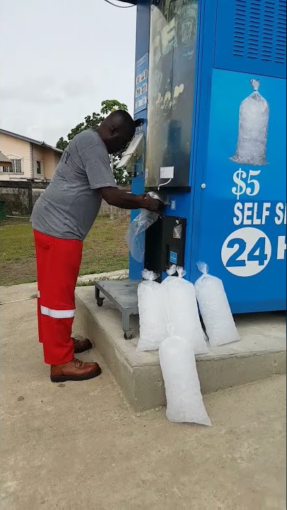 Ice and water vending machine