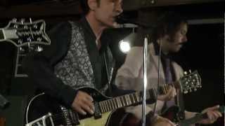 Tav Falco & The Unapproachable Panther Burns performing "White Silver Sands" in N.O.