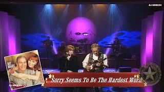 Video thumbnail of "Suzy Bogguss and Chet Atkins  - Sorry Seems To Be The Hardest Word (1994 Live)"