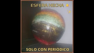 Esfera hecha solo de periodico. Sphere made only with newspaper