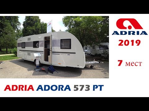 Прицеп-дача Adria Adora 573 PT. До 7 спальных мест в компактном фургоне.