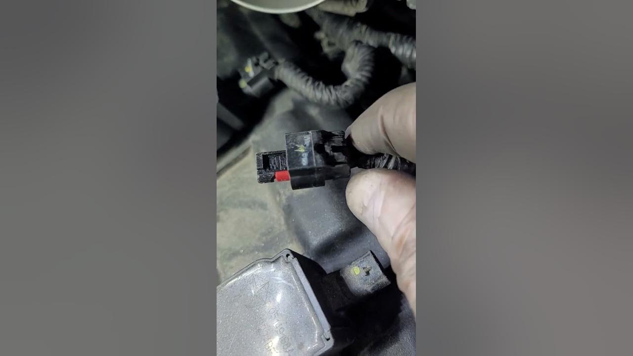 How to remove ignition coil clip from a 2011 Jeep Grand Cherokee WK2 3.