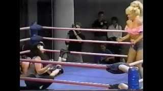G.L.O.W. "Amy the Farmer's Daughter & California Doll vs. Heavy Metal (Chainsaw & Spike)"