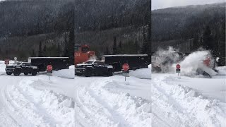 Truck Full of Snowmobiles Gets Stuck on Train Tracks