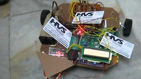 Bluetooth controlling Spy robot with ARM 7 LPC 2148 controller based