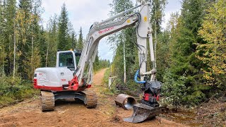 Replacing old concrete Culvert pipes in the Forest