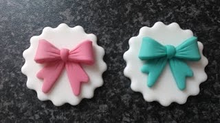 How to make easy pretty icing bows cup cake toppers every time by The Cake Tower