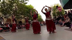 Odissi dancers in full attire dancing on Pacific Avenue.