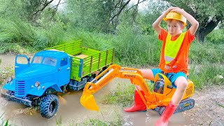 Darius is playing with excavator saving truck driver from water - Road Rules for Kids
