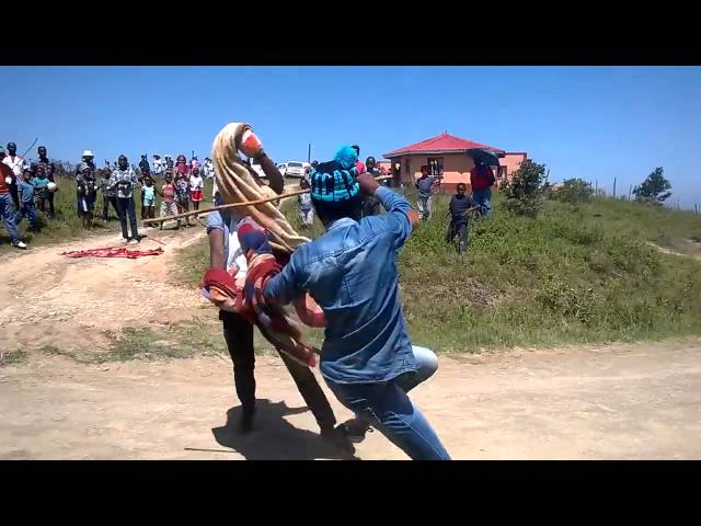 AFRIPICS - Two traditional Xhosa men stick fighting out in the open