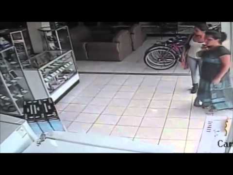 VIDEO Woman Steals TV Under Her Skirt In Only 13 Seconds 