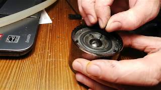 Repair of a dented speaker dome