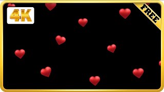 Red hearts falling black screen video loops