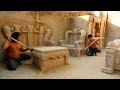 Building The most Creative Underground Living Room Construction with Shelves and Comfortable Sofas