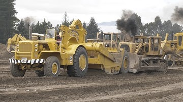 Caterpillar D9G Bulldozer pushing a CAT 630B Tractor Scraper