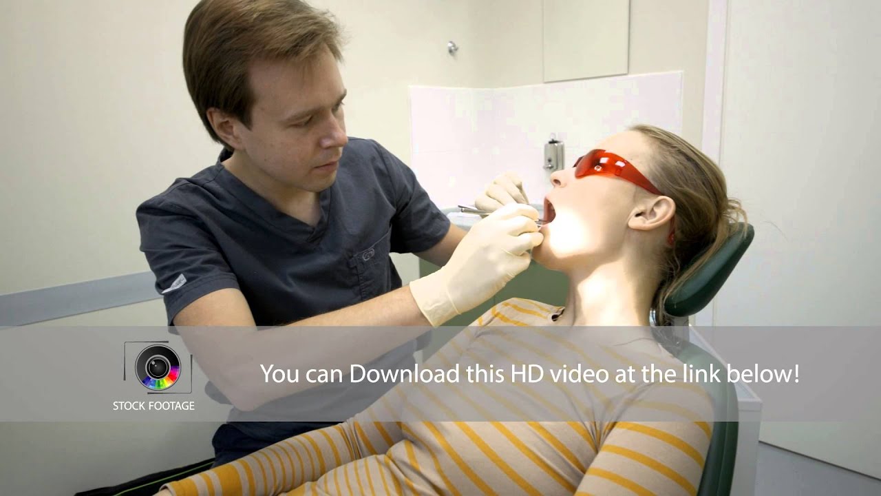 Doctor and patient in dental surgery YouTube