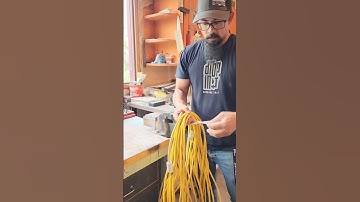 Easy extension cord storage trick.