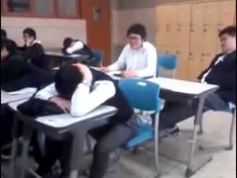Kid get slapped while sleeping in class.