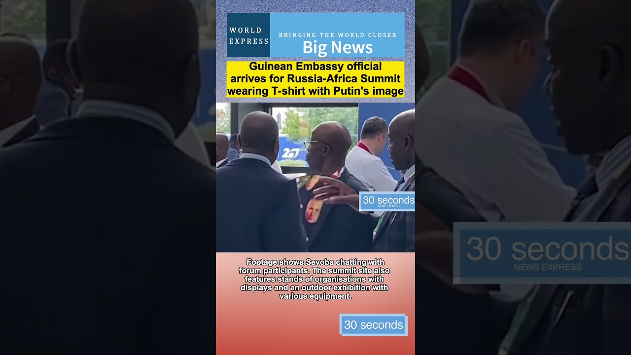 Guinean Embassy official arrives for Russia-Africa Summit wearing T-shirt with Putin's image