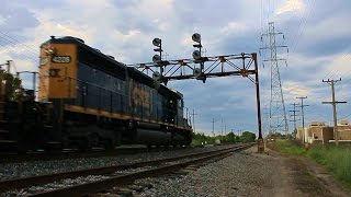 CSX SD40-3, ES40DC, & SD50-2 head east under the old C&O signal bridge w/ the remains of CSX Q289
