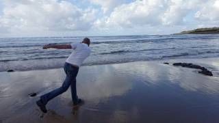 Skipping rock in slow motion on water