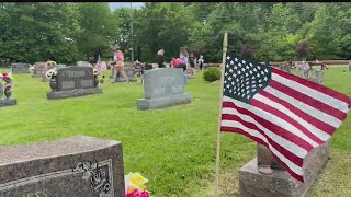 Niles students place flags on veterans' graves for Memorial Day